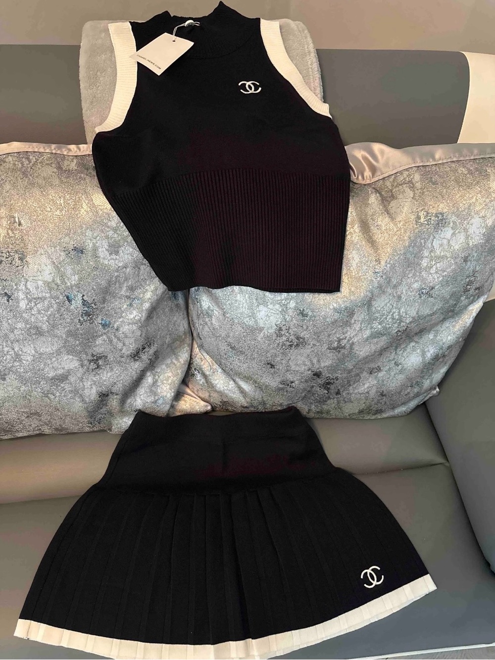 Black & White Ribbed Sleeveless Knit Top and Pleated Skirt Set